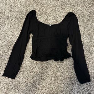 Black ruffled blouse